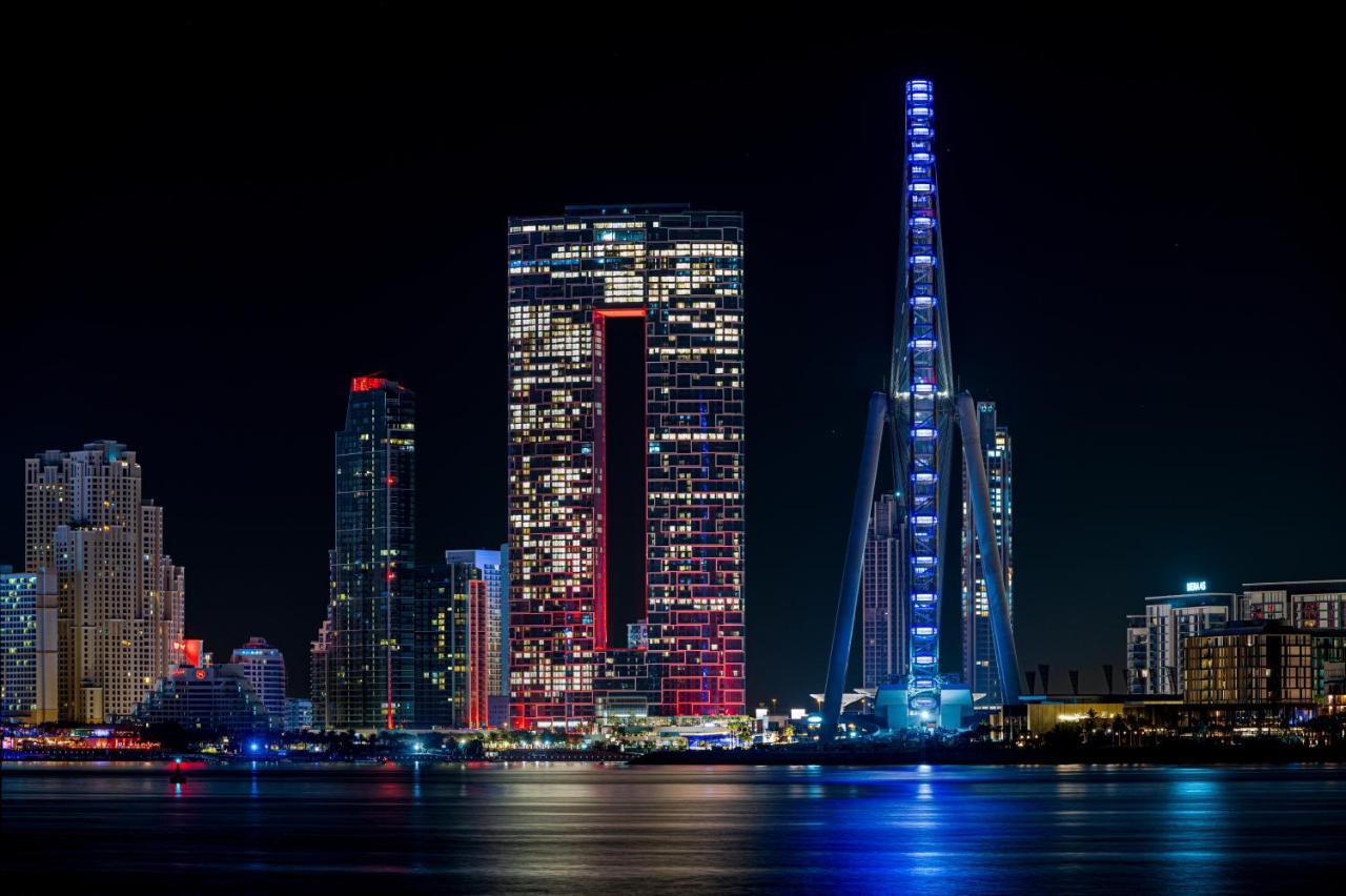Address Beach Resort Dubai Esterno foto View of the complex at night